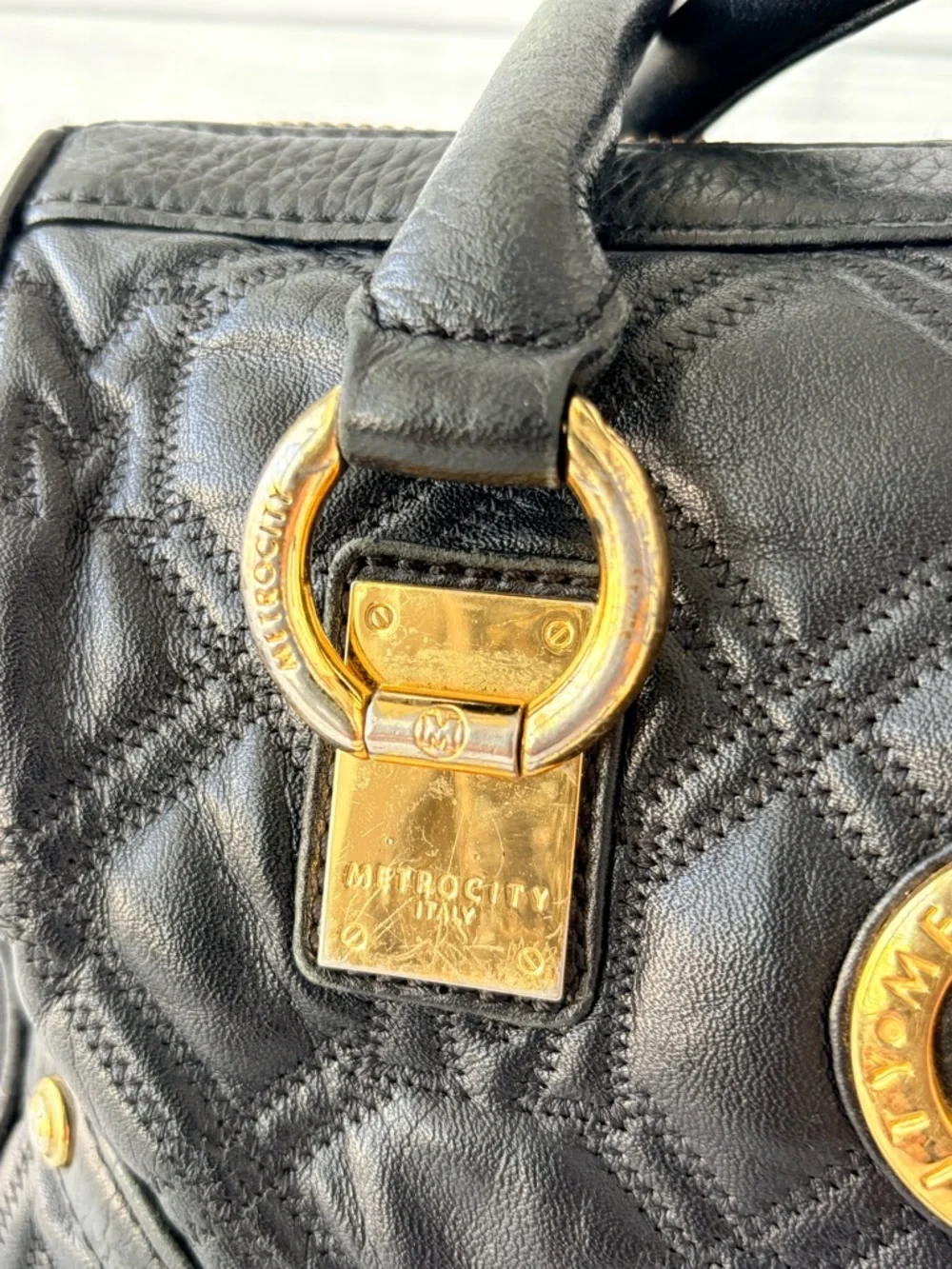 Metrocity Black Boston Bag with Gold‎ Accents
